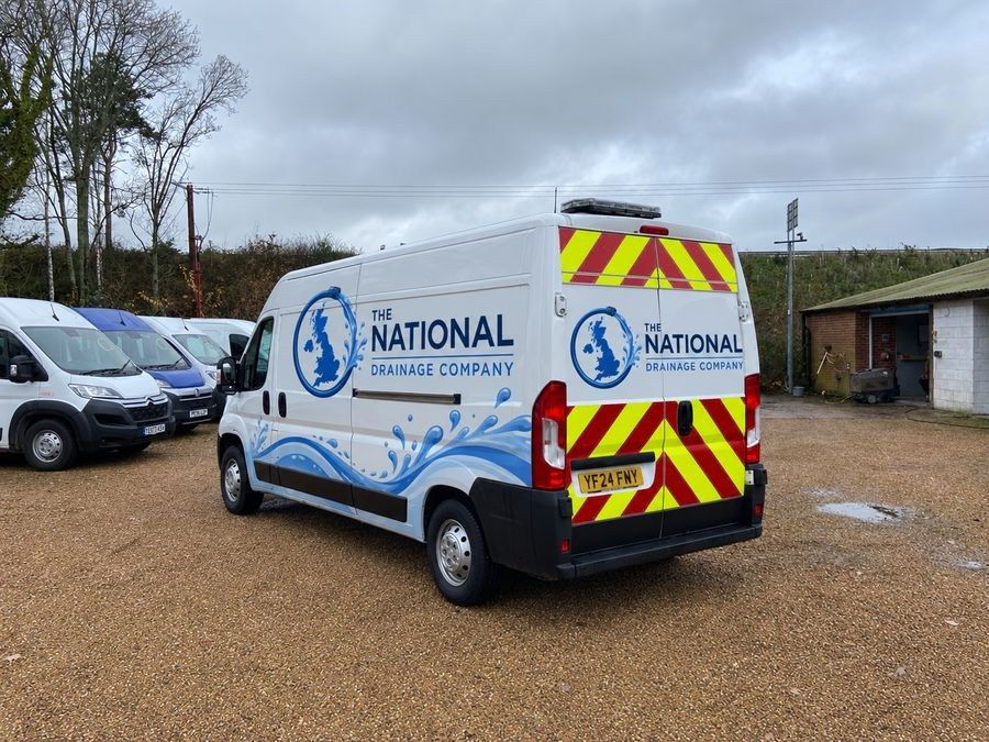 The National Drainage Company branded van